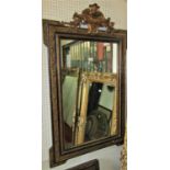19th century wall mirror of rectangular form with stepped and moulded gilt and ebonised frame