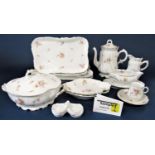 An extensive collection of Bavarian floral printed wares including large two handled tureen and
