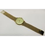 Good vintage gents 9ct Jaeger Le Coultre wristwatch, with convex champagne dial and baton markers