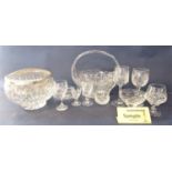 A large collection of cut glass to include goblets, decanters, bowls, together with a small