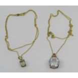 9ct rutilated quartz pendant necklace, 3.4g and a further quartz example set with small diamonds, 6g