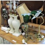 An early 20th century Pullman brass lamp with later glass shade, a contemporary bankers type table