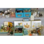Collection of miniature perfume bottles with and without contents, including novelty shapes and a