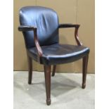 A Georgian style open armchair with dark leather upholstered seat, arched back and arm rests with