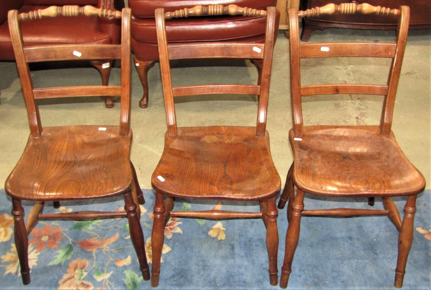 A set of three 19th century Windsor moulded bar back kitchen chairs with turned top rails, - Image 4 of 5
