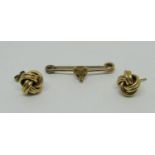 15ct fox mask stock pin (replacement pin), 2.3g and a pair of 9ct knot stud earrings (one