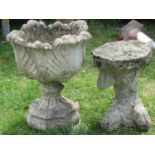 A reclaimed garden urn with acanthus leaf bowl and foliate socle with foliate octagonal base,