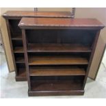 A pair of dwarf oak freestanding open bookcases with applied split bead mouldings and adjustable