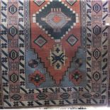 Turkish Caucasian type rug with green and orange central medallions upon a light ground, 240 x 150