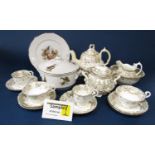 A quantity of Victorian tea wares with grey and gilt border decoration including a pair of covered