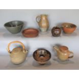 A collection of Studio pottery ware including teapot, bowls, etc by Winchcombe pottery and others