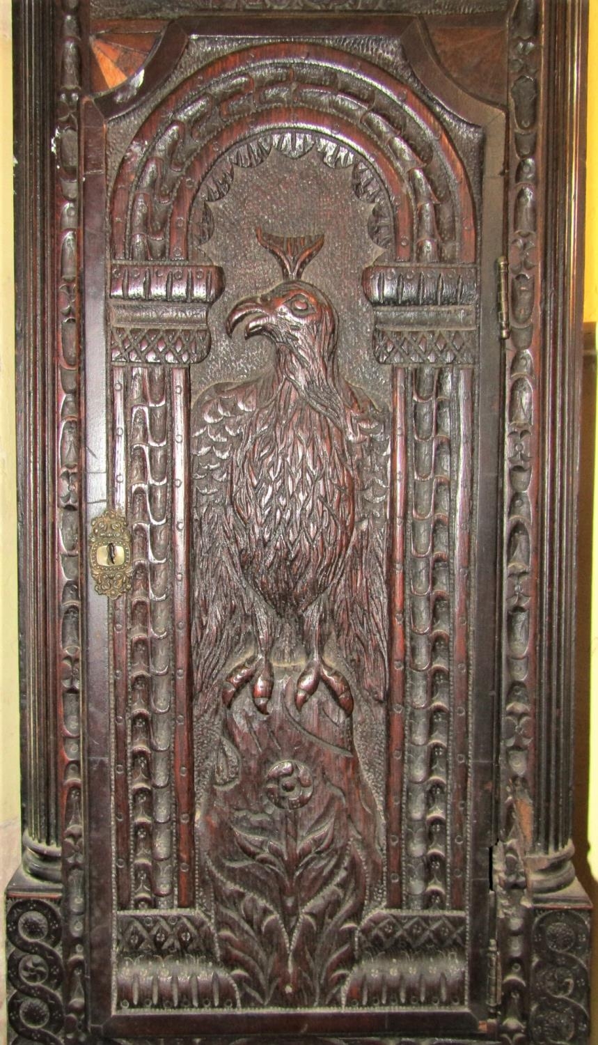 A 19th century oak longcase clock, the case profusely carved depicting a lion, eagle, cherubs, - Image 3 of 7