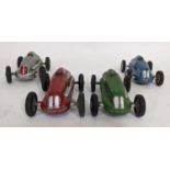 4 unboxed 1940's/50's toy cars 'The Mighty Midget Electric Racer' each with pressed metal shell