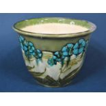 An early 20th century Minton jardinière with moulded and painted art nouveau style blue floral