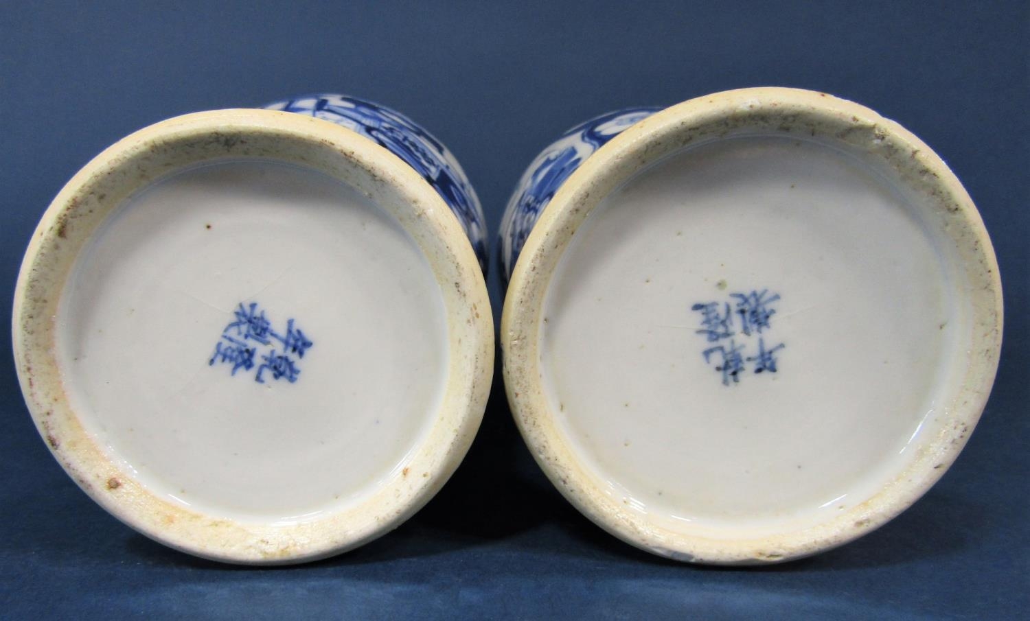A pair of 19th century Chinese blue and white vases of shouldered form with reserved painted - Image 3 of 3