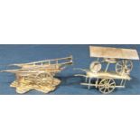 Cast silver model of a hand cart, maker P J S, London 1978, 9 cm long, together with a further Dutch