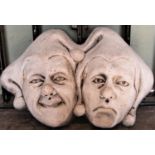 A reclaimed jester twin wall mask 40 cm wide x 26 cm approximately
