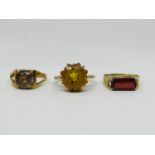 Three vintage 9ct rings set with garnet, hessonite and yellow topaz, 8.2g total (3)