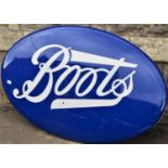 A reclaimed oval moulded fibre glass boots sign 125 cm x 80 cm