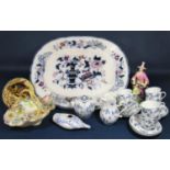 A collection of 19th century continental teawares with blue painted floral sprigs and fluted