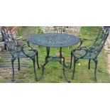 A contemporary green painted cast aluminium three piece garden terrace set comprising a table with