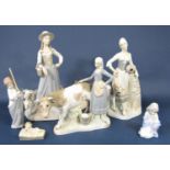 A collection of Spanish Zaphir ceramics in the Lladro style comprising a female shepherdess, 40cm
