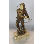 Early 20th century model of a fisherman hauling a rope with carved ivory facial and hand features,