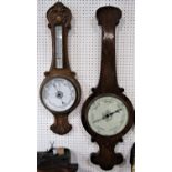 Unusually broad burr walnut barometer, 100 cm high, together with a further oak aneroid barometer