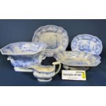 A quantity of early 19th century blue and white printed wares showing Indian scenes including