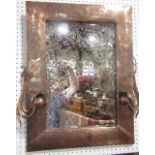 Arts and crafts copper and white metal inlaid girandole wall mirror with floral scrolled sconces and