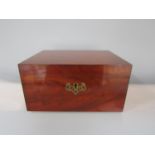 A good quality flame mahogany jewellery casket made by cabinet maker Matthew Smith of Swallows
