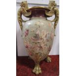 A substantial late 19th century two handled vase with painted magnolia and other floral detail,