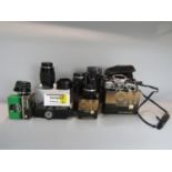 A mixed lot comprising a selection of vintage camera equipment and a collection of silver plated