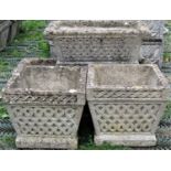 Four reclaimed garden planters, varying size and design, all with similar lattice detail