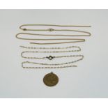 Group of 9ct jewellery; two fine link chain necklaces and a St Christopher, 6.2g total (all af) (3)