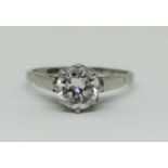 Good quality white metal diamond solitaire ring in raised claw setting, the stone 1.25cts approx,