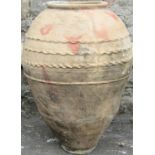 A buff coloured terracotta urn/jar with pressed coiled detail, 74 cm high