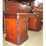 A good quality mid-Victorian period pedestal sideboard with inverted centre, the pedestals enclosing