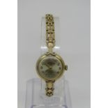 Vintage ladies Rotary 9ct dress/cocktail watch, the circular gilt dial with gilt Arabic numerals and