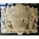 A reclaimed wall/fountain head with deep lions mask acorn and oak leaf detail, 44 cm wider x 30 cm