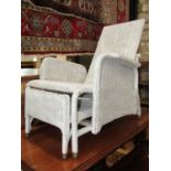 A Lloyd Loom W Lusty & Son Ltd reclining chair with adjustable back, stowaway foot rest and over