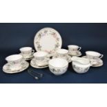 A collection of Royal Worcester June Garland pattern teawares comprising milk jug, sugar bowl,