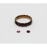 Georgian yellow metal garnet eternity ring, size M, 1.4g (7 stones vacant including 2 loose but