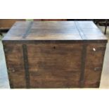 A steel banded hardwood chest with hinged lid and side carrying handles, 92cm long x 59cm wide x