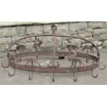A wrought iron game crown of oval form supporting twelve hooks with raised applied sheet cut stag,