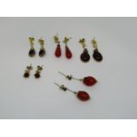 Five pairs of yellow / gilt metal gem set drop earrings of various design (10)