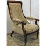 A Victorian mahogany drawing room chair with carved and moulded showwood frame and upholstered