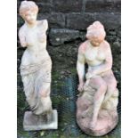 A small reclaimed garden ornament/statue in the form of Venus, together with one other