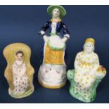 Two early 19th century pottery figures, both seated female characters, one with painted detail in