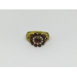Georgian yellow metal ring set with garnets and seed pearls, size K/L, 3.6g